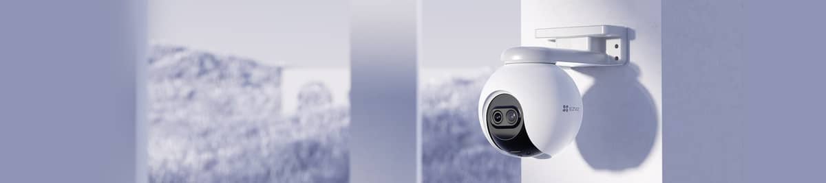 EZVIZ outdoor pan-and-tilt camera mounted on a villa wall